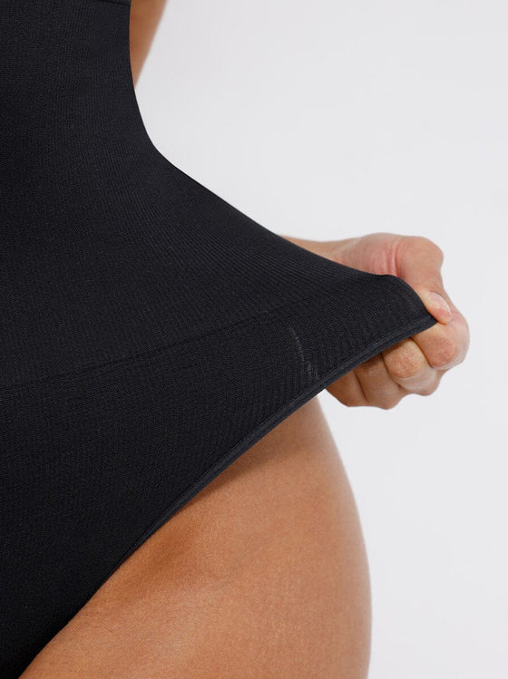 Wholesale Seamless Deep V Waist and Abdomen Shaping Thong Bodysuit